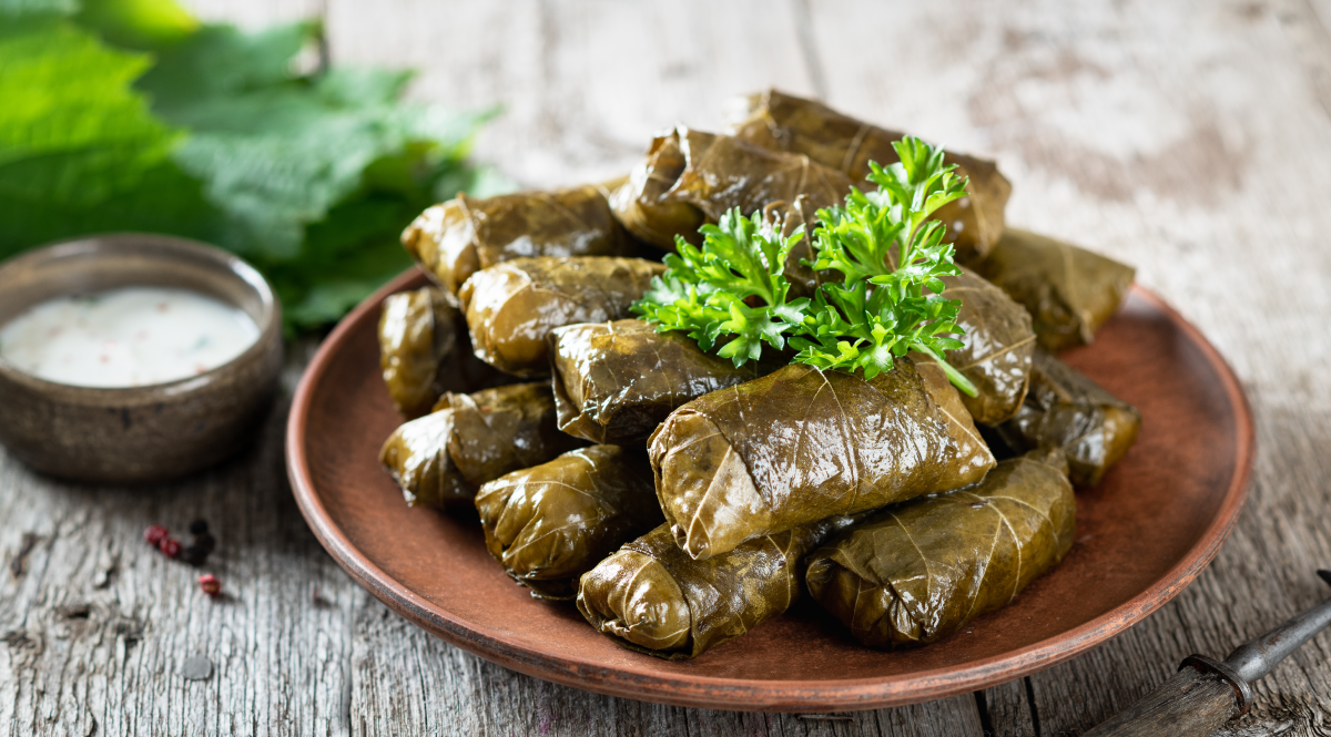 Dolmades on a wooden background