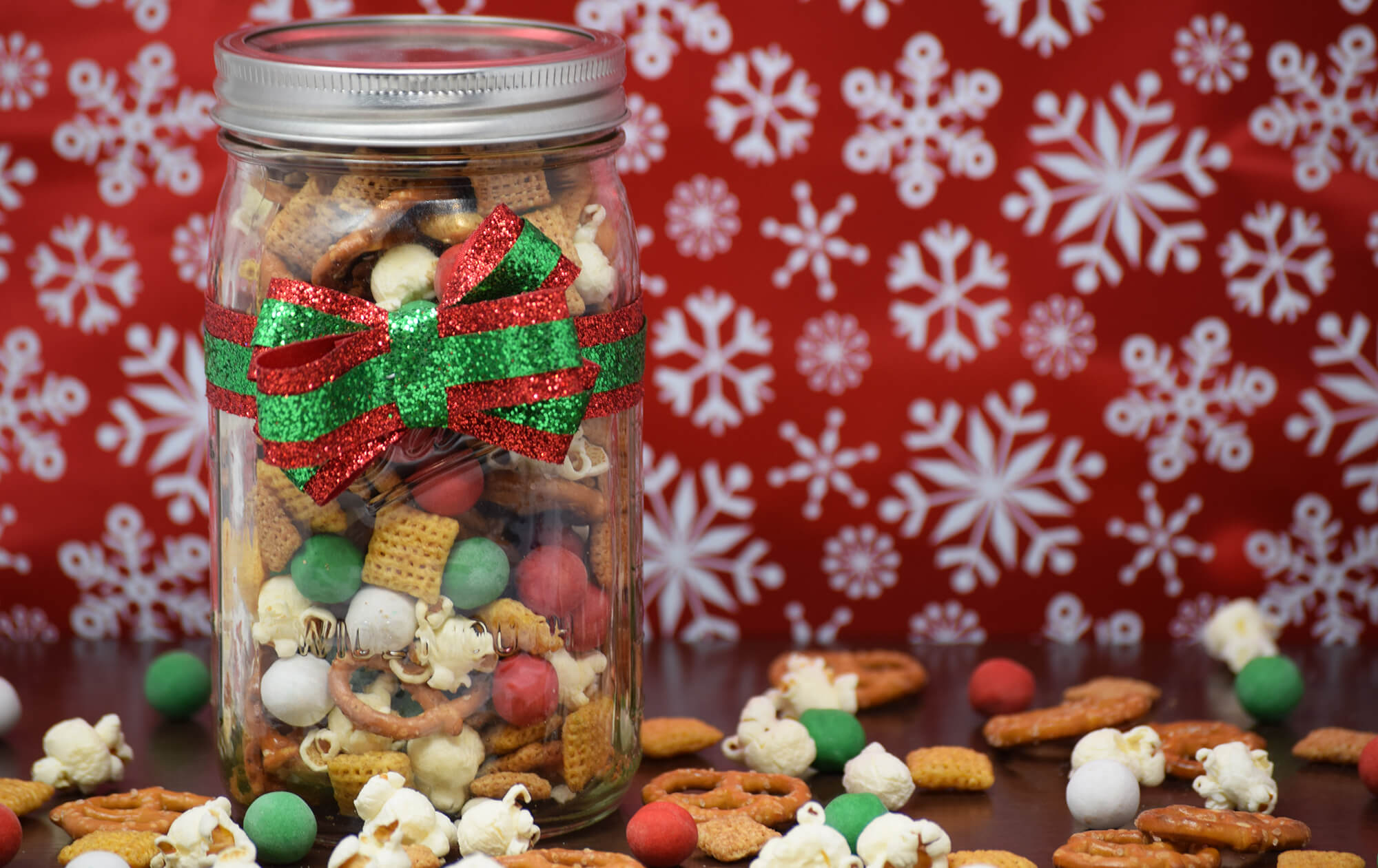 A mason jar filled with sweet and salty treats